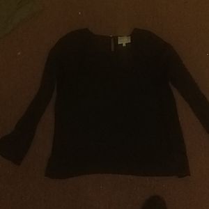 See through black beautiful spring shirt.